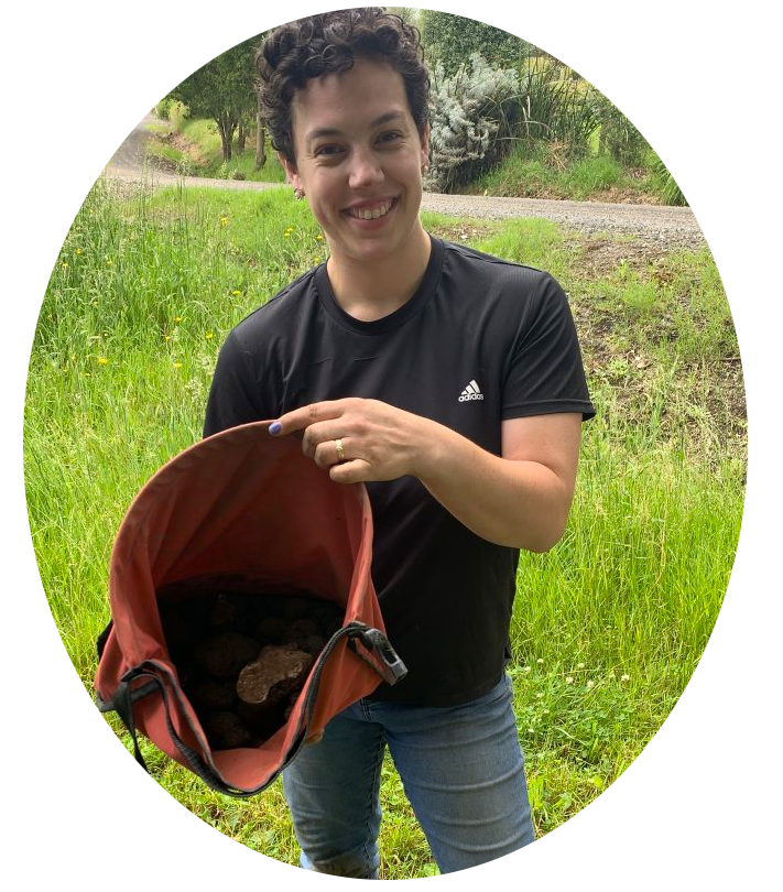Simone Thomas holding truffles found during the season